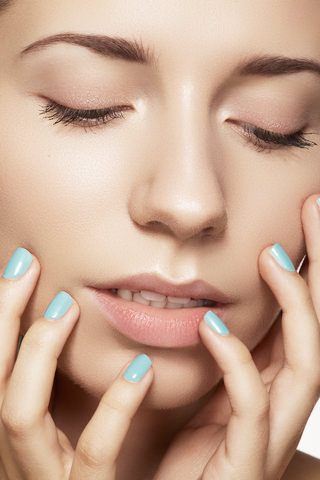 http://www.dreamstime.com/stock-photo-close-up-beauty-model-face-natural-make-up-bright-manicure-image27699910